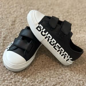 Black and white Burberry sneakers.